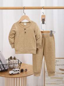 Cute Spring & Fall Casual Style Baby Boy Set - Pure Knitted T-Shirt + Comfortable Pants, Simple Yet Childlike. Crafted With Soft, Skin-Friendly Fabrics, The T-Shirt Showcases A Fresh Solid Color For A Classic, Versatile Look. Paired With Matching Or Contrast Color Pants, It Creates A Cute Casual Outfit For Everyday Wear. Stylish Silhouette Allows For Easy Movement And Appeal, Letting Your Little One Freely Run Under The Spring Sunlight And Enjoy The Carefree Childhood.