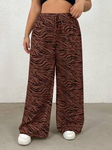 SHEIN EZwear Pantalones rectos con estampado de cebra de talla grande, estilo casual