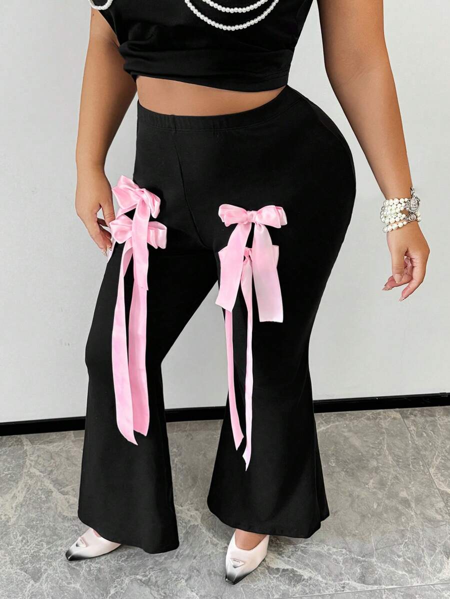 SHEIN SXY Quần ống loe nơ đen hồng dễ thương cỡ lớn dành cho nữ, thích hợp cho đêm Giáng sinh, mùa thu và mùa đông, đêm hẹn hò, sinh nhật, tiệc độc thân, dễ thương, giản dị, mua sắm, thời trang dạo phố, đi chơi, dễ phối đồ và trông thon gọn, tôn lên vóc dáng, tôn dáng - màu đen - Xem 1