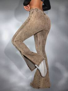 SHEIN SXY Vaqueros ajustados con pierna acampanada, con dobladillo deshilachado y rasgado, a la moda