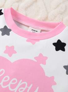 Conjuntos a juego para hermanos (se venden por separado 2 sets) Conjunto de pijama de 2 piezas de niña joven con pantalón largo y top de manga larga con estampado minimalista de estrellas en un diseño cómodo y ajustado - Rosa - Ver 6