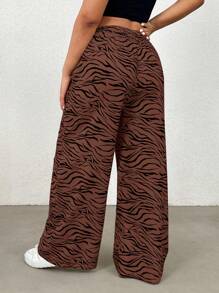 SHEIN EZwear Pantalones rectos con estampado de cebra de talla grande, estilo casual