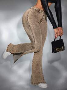 SHEIN SXY Vaqueros ajustados con pierna acampanada, con dobladillo deshilachado y rasgado, a la moda