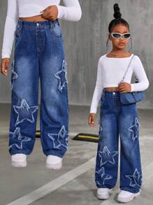 SHEIN Pantalones vaqueros rectos y sueltos con bordado de estrella desgastada para niña preadolescente, pantalones de mezclilla azul lavada de estilo casual y versátil - Azul lavado medio - Ver 1