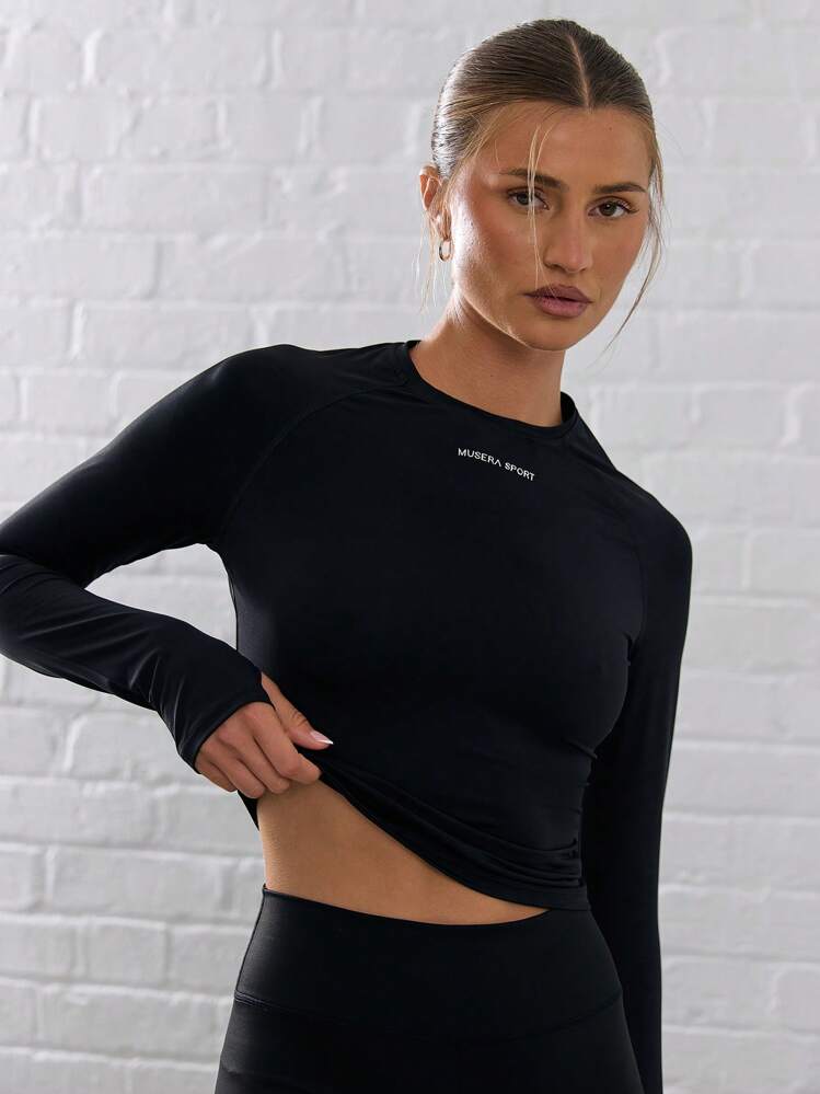 Musera Sport Top corto de manga larga con agujero para el pulgar, de material suave y elástico, ideal para actividades como pádel, tenis, pickleball, gimnasio, fitness, yoga, pilates y uso casual diario - Negro - Añade 1