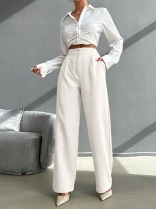 Pantalon à jambe droite avec détail plissé et taille haute, boutons élégants pour dames au printemps/automne, poches, fermeture éclair, taille haute, jambe large longue, ample, couleur abricot, pantalon pour femmes, porter au quotidien de manière décontractée