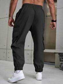 Manfinity Homme Quần dài thường ngày có túi hộp màu trơn cỡ lớn dành cho nam, thu - màu đen - Xem 2