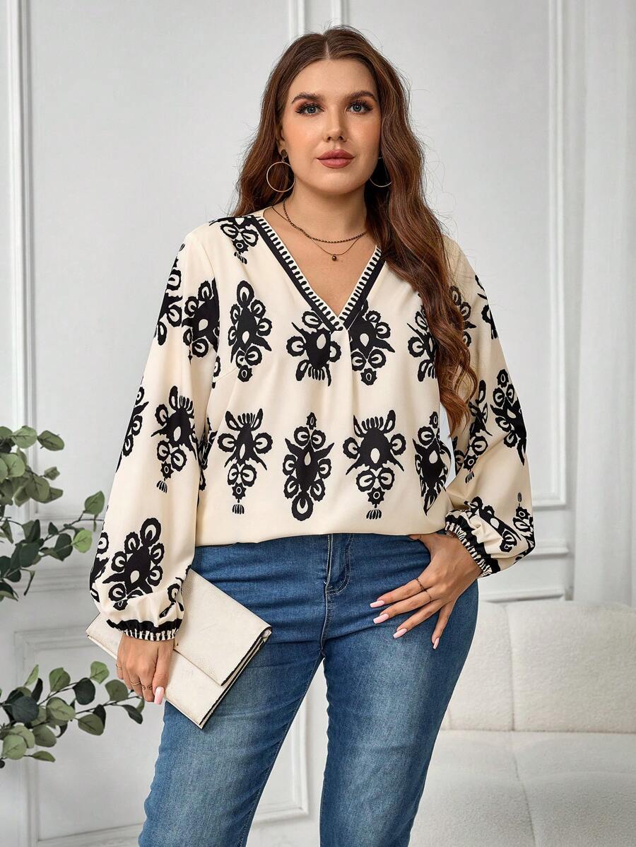 SHEIN LUNE Blusa de manga larga con cuello en V, diseño de puño recogido y estampado floral para mujer de talla grande, ideal para vacaciones - Multicolor - Ver 1