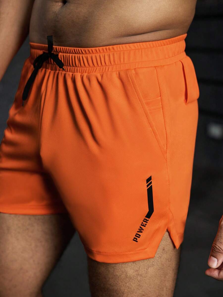 Manfinity Fitness Men's Plain Color Splicing Lace-Up Pocket Simple Casual Sports Shorts - Orange - View 1