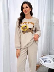 Pijama de mujer informal con parte superior de manga larga con cuello redondo y estampado de letras y gato de dibujos animados, y pantalones