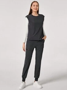 TaskEZ Conjunto informal de uniforme de scrubs con top cuello redondo minimalista y pantalón de chándal con bolsillo