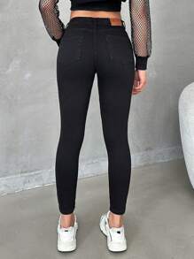 EURMUSE Casual Solid Low Waist Ripped Skinny Jeans - Black - View 2