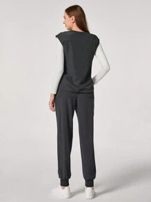 TaskEZ Conjunto informal de uniforme de scrubs con top cuello redondo minimalista y pantalón de chándal con bolsillo