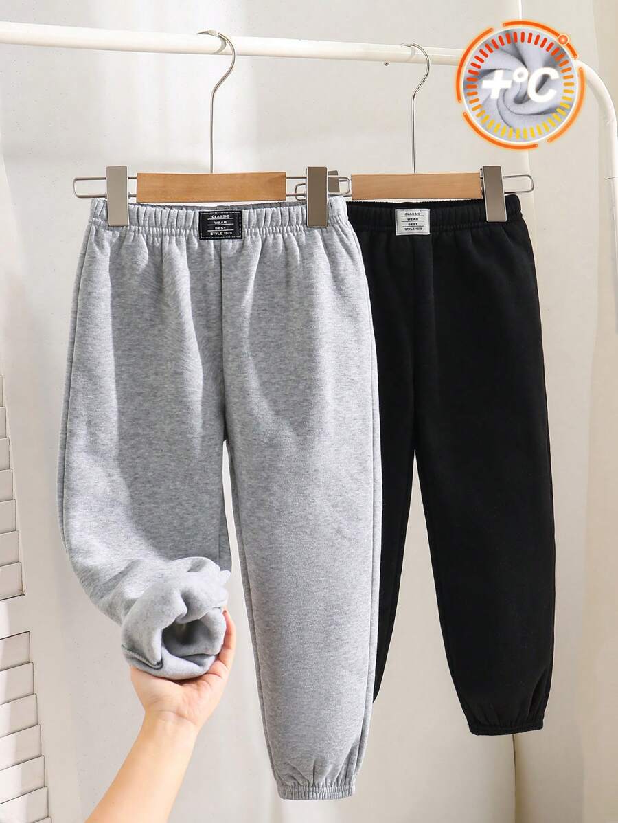 SHEIN Leap Crew 年轻男孩 2 件套休闲日常字母印花松紧腰宽松纯色运动裤多件装，1 黑色和 1 灰色，针织裤套装适合学校、花园、海滩、生日、春/夏/秋/冬季 - 彩色 - 查看 1