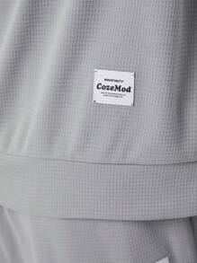 Manfinity NXTstreet Set de 2 piezas de sudadera de cuello redondo y pantalones de punto de talla grande para hombres