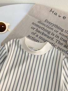 SHEIN Conjunto de 3 piezas de ropa para bebé niña con: Top de manga larga con cuello de tortuga a rayas, chaleco de peluche y pantalones largos acanalados gruesos, para otoño e invierno