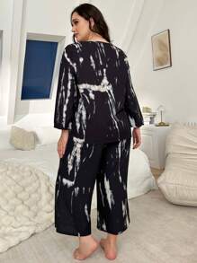 Conjunto de pijama de talla grande para mujer con top con cuello en V y estampado de teñido anudado, y pantalones anchos de pierna ancha