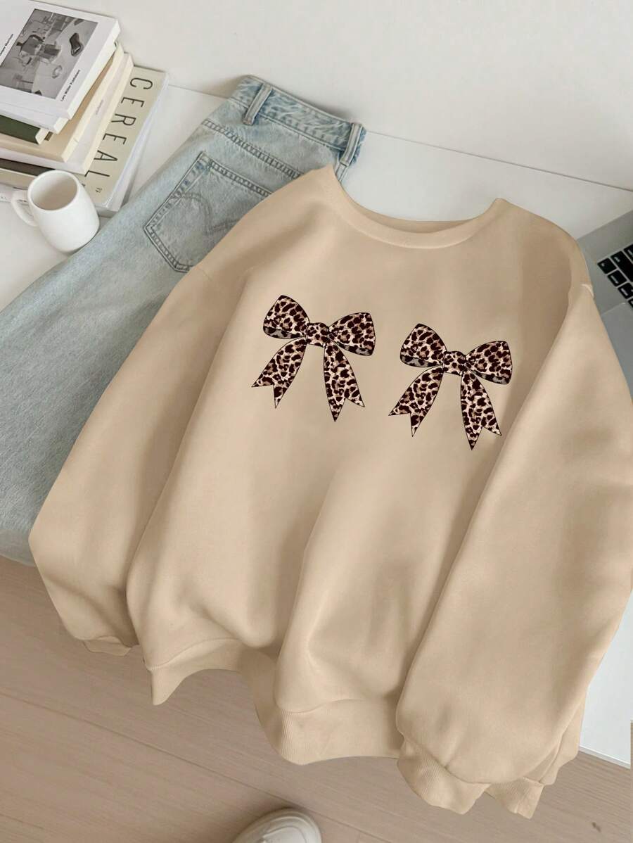 SHEIN EZwear Áo nỉ trùm đầu cổ tròn dài tay họa tiết nơ báo đơn giản, thoải mái cho nữ - Màu be - Xem 1