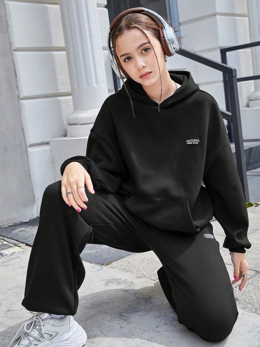 SHEIN Teen Girls Black/Solid Color/Letter Logo Hooded Sweatshirt And Pouch Pocket Sweatpants 2 Pieces Set, Casual/School/Sports Matching Set