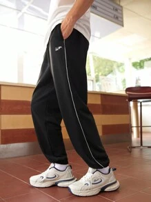 Manfinity Sport Corelite Quần Jogger Thể Thao Sọc Hai Bên Lưng Thun Co Giãn Phong Cách Bạn Trai Cho Nam Mùa Thu - màu đen - Xem 2