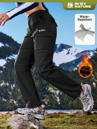 In My Nature Pantalones de senderismo impermeables, forrados y cálidos con bolsillos con cremallera para mujer, ideales para actividades al aire libre