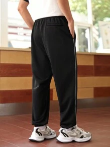 Manfinity Sport Corelite Quần Jogger Thể Thao Sọc Hai Bên Lưng Thun Co Giãn Phong Cách Bạn Trai Cho Nam Mùa Thu - màu đen - Xem 8
