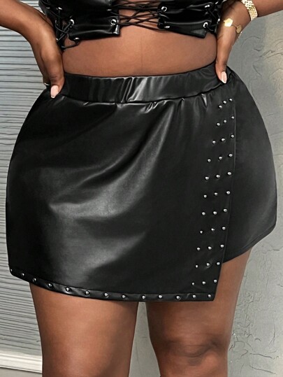 Slaydiva Women Plus Size Black Asymmetrical Hem Studded PU Leather Mini Shorts/Skort, Elegant Slim Fit For Party, Music Festival, Spring Summer