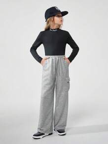 SHEIN Tween Girls Casual Street Style Solid Color Drawstring Waist Flap Pocket Loose Cargo Sweatpants