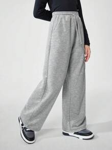 SHEIN Tween Girls Casual Street Style Solid Color Drawstring Waist Flap Pocket Loose Cargo Sweatpants