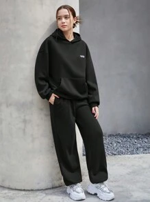 SHEIN Teen Girls Black/Solid Color/Letter Logo Hooded Sweatshirt And Pouch Pocket Sweatpants 2 Pieces Set, Casual/School/Sports Matching Set
