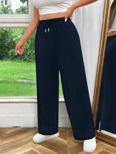 SHEIN Plus Size Enfärgad elastisk midja Dragsko Raka benbyxor, lämpliga för höstsäsongen