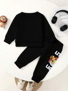 SHEIN Áo nỉ dài tay cổ tròn in chữ và hình chú sư tử nhỏ dễ thương và vui nhộn cho bé trai, trang phục thời trang - màu đen - Xem 2