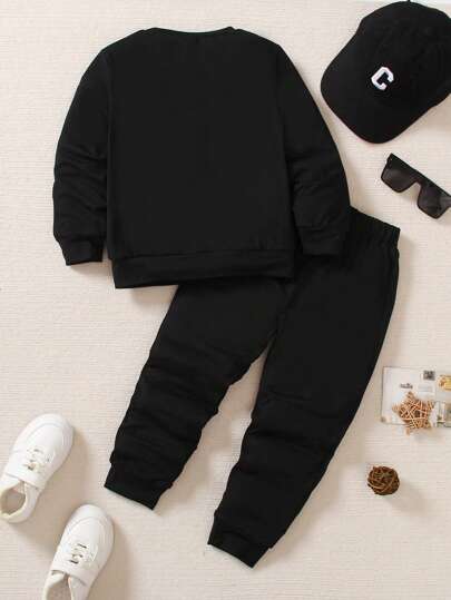 SHEIN Genkimix Kids 2pcs Young Boys Elastic Knit Crew Neck Smiling Face Print Long Sleeve T-Shirt And Smiling Face Print Elastic Knit Sports Pants Set, Suitable For Casual Daily Wear, Spring & Autumn Black Outfit For Kidsblack Young Boys Sets