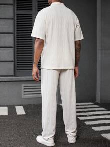 Manfinity Homme 2 pièces Ensemble polo à manches courtes de couleur unie à texture tricotée avec poches et pantalon décontracté pour hommes, tenue deux pièces pour hommes