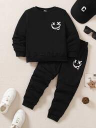 SHEIN Genkimix Kids 2pcs Young Boys Elastic Knit Crew Neck Smiling Face Print Long Sleeve T-Shirt And Smiling Face Print Elastic Knit Sports Pants Set, Suitable For Casual Daily Wear, Spring & Autumn Black Outfit For Kidsblack Young Boys Sets