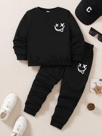 SHEIN Genkimix Kids 2pcs Young Boys Elastic Knit Crew Neck Smiling Face Print Long Sleeve T-Shirt And Smiling Face Print Elastic Knit Sports Pants Set, Suitable For Casual Daily Wear, Spring & Autumn Black Outfit For Kidsblack Young Boys Sets