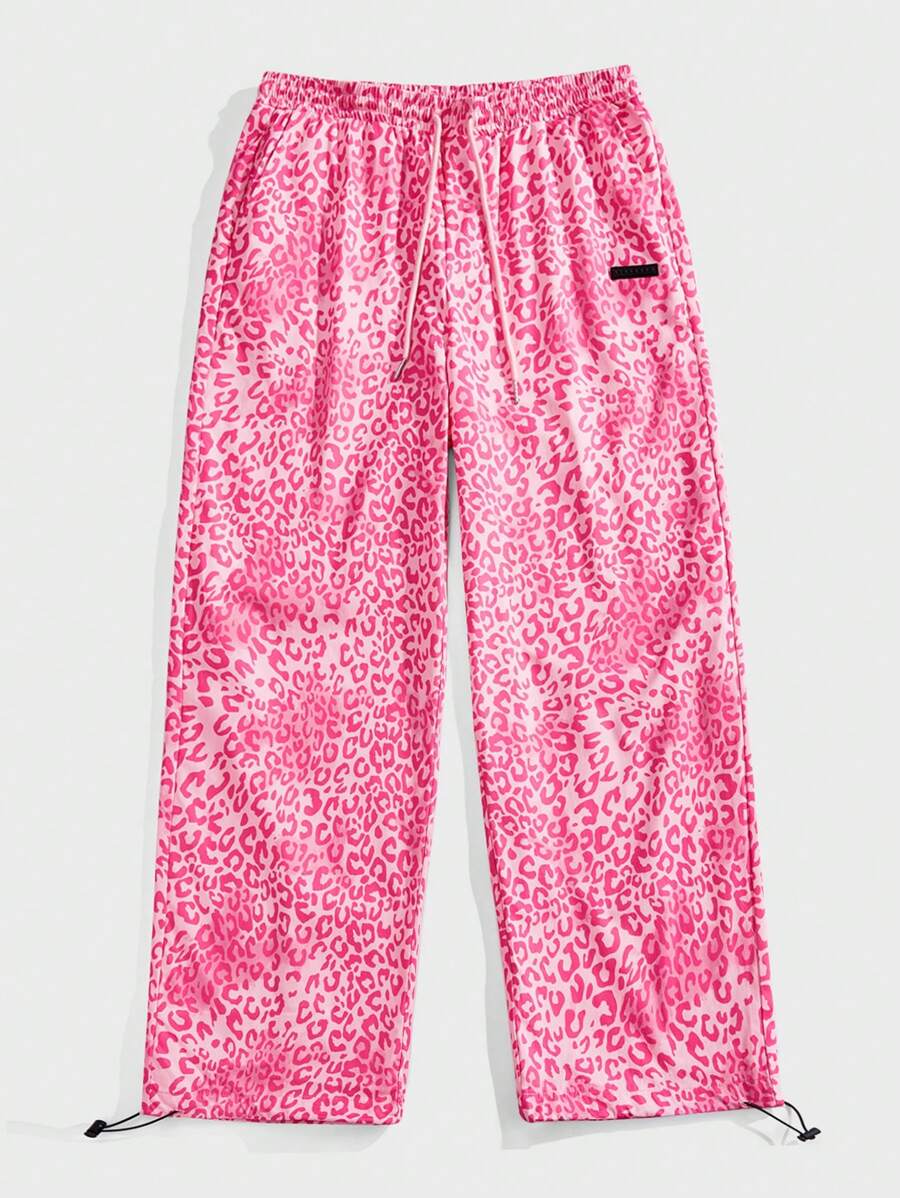 Manfinity RebelGame Calça Masculina com Estampa de Onça e Cordão na Cintura - Rosa chiclete - Visão 1