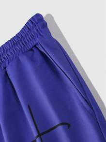 Manfinity LEGND Conjunto de 2 piezas para hombre talla grande: sudadera de cuello redondo con estampado de letras en degradé y pantalón de chándal, informal