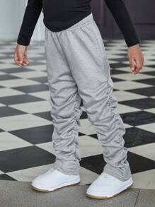 SHEIN Explorewe Girls' Casual Pleated Pants. The Pleated Design Brings A Unique 3D Effect To The Pants, Showcasing An Elegant And Fashionable Style. These Sweatpants Are Suitable For Girls To Wear In Casual Occasions, Highlighting Their Personalized And Charm. The Pleated Design Gives The Pants A Special Visual Effect, Exhibiting The Fashion Sense And Unique Elegant Of Young Girls.