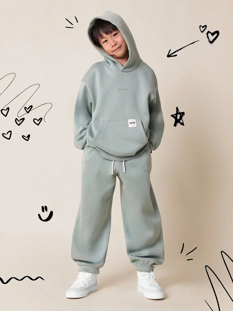 Completo tuta in pile verde menta accogliente, indossa una tuta due pezzi con cappuccio per un abbigliamento casual e confortevole