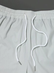 Manfinity Sport Corelite Boyfriend Style Men's Solid Color Zipper Front Short Sleeve Top And Shorts Casual Sports Suit Set