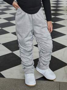 SHEIN Explorewe Girls' Casual Pleated Pants. The Pleated Design Brings A Unique 3D Effect To The Pants, Showcasing An Elegant And Fashionable Style. These Sweatpants Are Suitable For Girls To Wear In Casual Occasions, Highlighting Their Personalized And Charm. The Pleated Design Gives The Pants A Special Visual Effect, Exhibiting The Fashion Sense And Unique Elegant Of Young Girls.