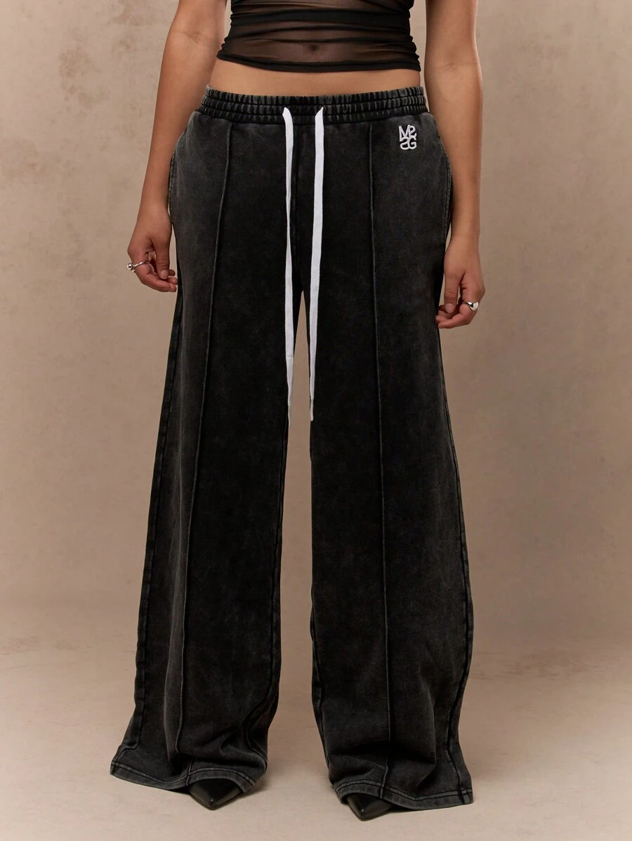 MISSGUIDED Quần dài thể thao ống rộng siêu thoải mái, quần dài thể thao có dây rút, eo co giãn, túi bên hông, logo thiết kế, trang phục thường ngày thu đông - màu đen - Xem 1