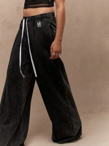 MISSGUIDED Quần dài thể thao ống rộng siêu thoải mái, quần dài thể thao có dây rút, eo co giãn, túi bên hông, logo thiết kế, trang phục thường ngày thu đông - màu đen - Xem 3