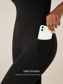 GLOWMODE 24 英寸 FeatherFit™ 收腹交叉绑带背部紧身连体衣 带侧袋 低冲击瑜伽日常可拆卸罩杯