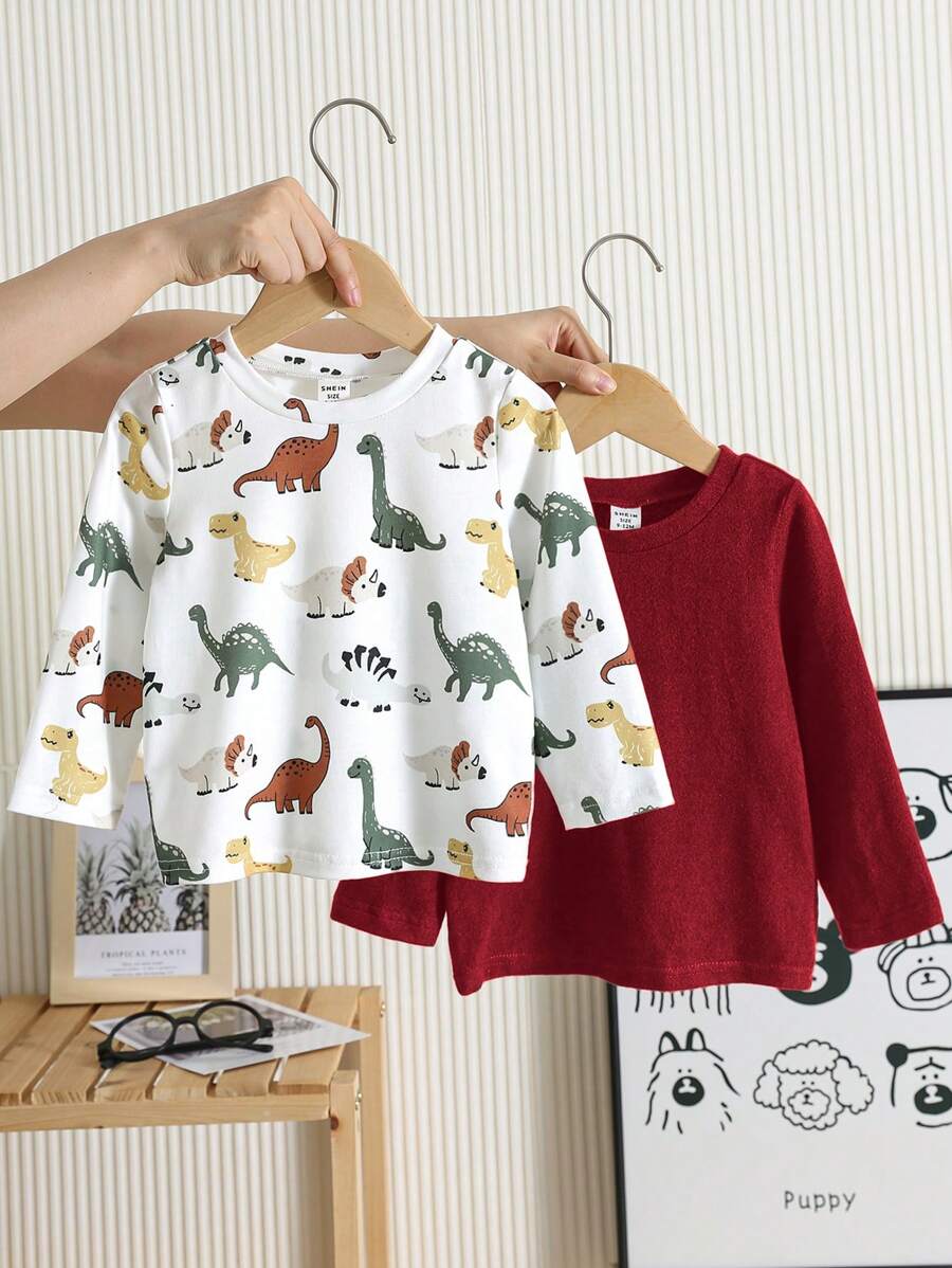 SHEIN Leap Crew Set de 2 piezas con parte superior de manga larga con estampado de dinosaurio lindo y parte superior de manga larga de unicolor para niño/niña, ropa casual de uso diario, apta para primavera, otoño e invierno - Multicolor - Ver 1