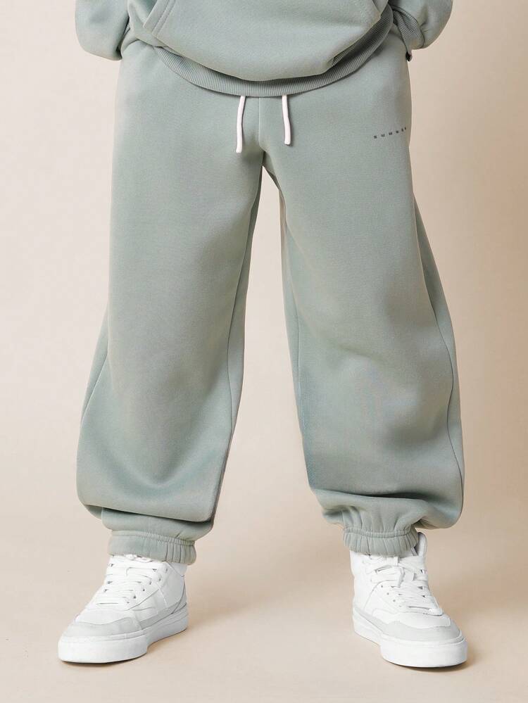 Completo tuta in pile verde menta accogliente, indossa una tuta due pezzi con cappuccio per un abbigliamento casual e confortevole