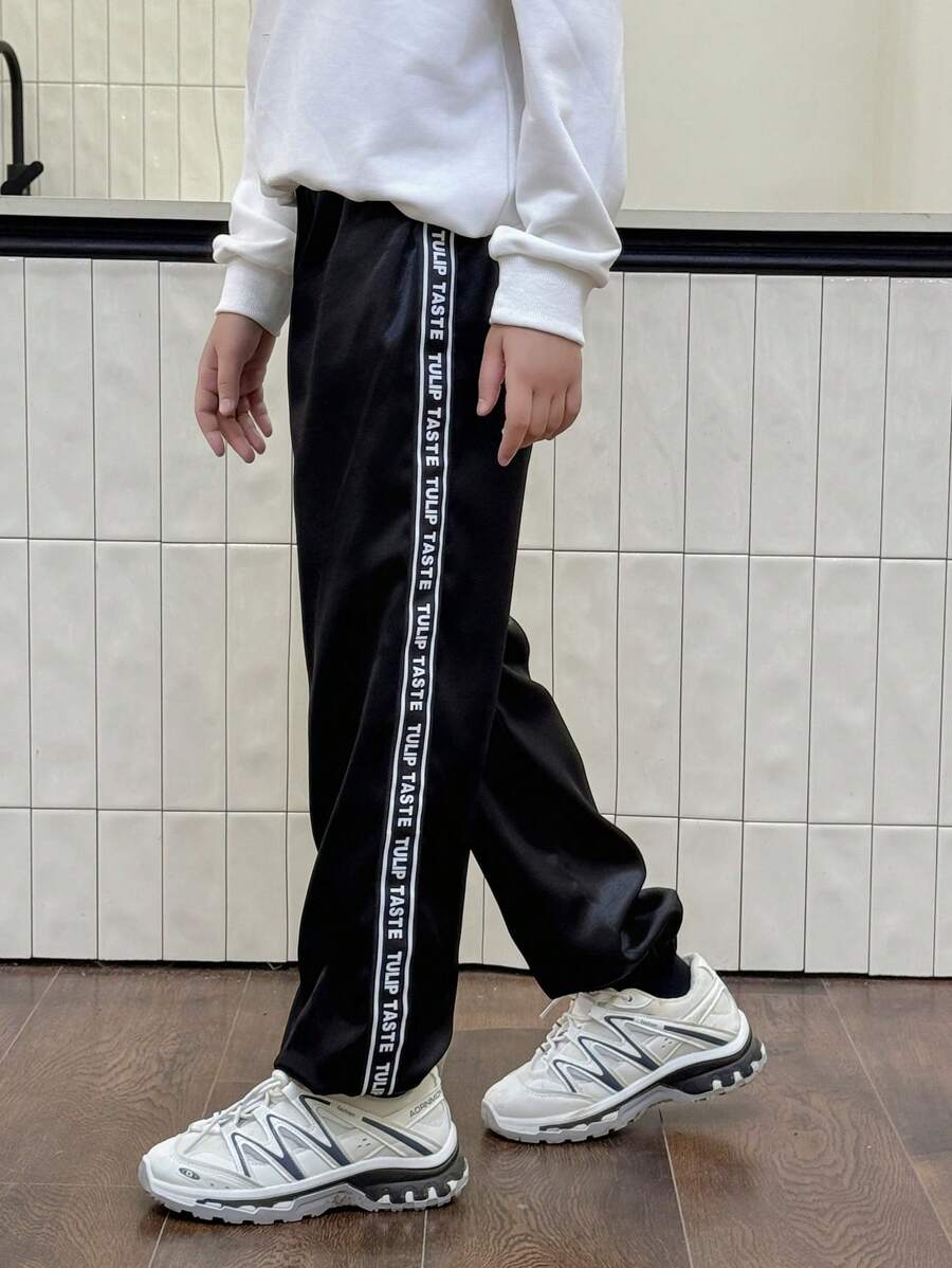 SHEIN Tween 女童缎面卷边慢跑裤,时尚休闲街头运动风格 - 黑色 - 查看 1