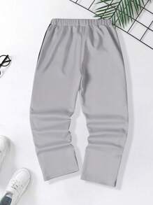 SHEIN Older Kids Boys Streetwear Hip Hop Vintage Cartoon Letter Print Contrast Patchwork Casual Regular Straight Fit Pants - Light Grey - View 2