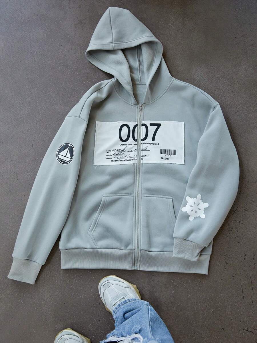 Manfinity EMRG Áo hoodie thường ngày in chữ dài tay có khóa kéo phía trước cho nam, Quà tặng cho bạn trai, Áo nỉ nam họa tiết vui nhộn, Áo len xám in chữ "007" - Xám - Xem 1